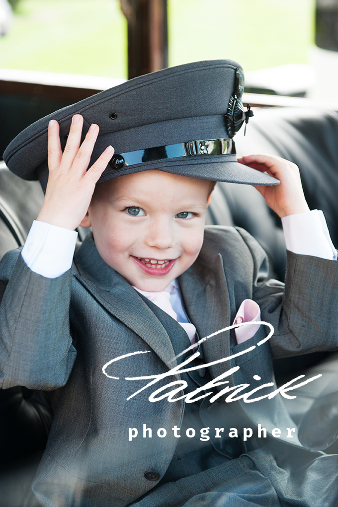 cute paige boy wearing chauffeur hat