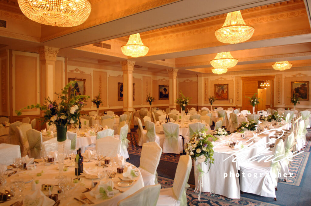 wedding breakfast decorated tables down hall