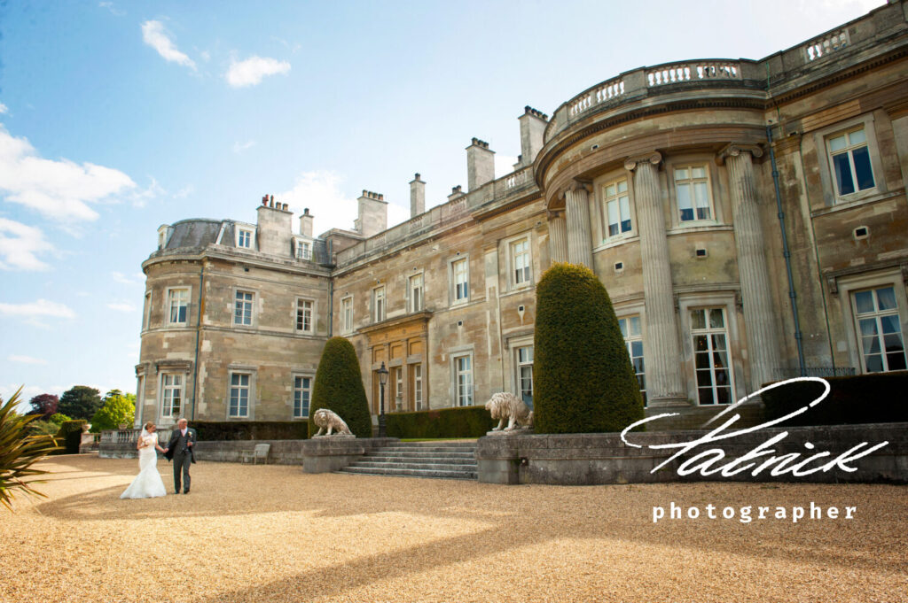 Luton Hoo, bride and groom, holding hands, blue sky, facia, angle, sarah and matt holman