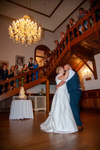 holmewood, cambridge, bride and groom, first dance, chandeliers, guests