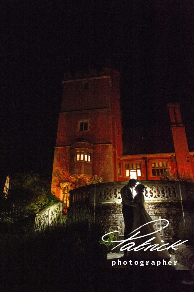 lanwades hall, bride and groom silhoutte, atmospheric lighting, low level aspect