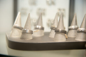 standard wedding rings displayed on cones
