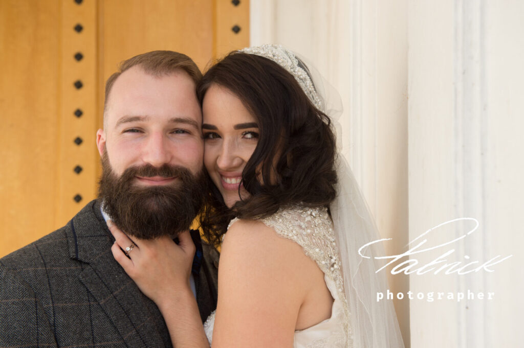 smiling bride and bearded groom at Hertford county