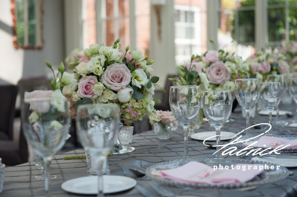 interior conservatory st Michaels manor wedding breakfast tables bouquet close up