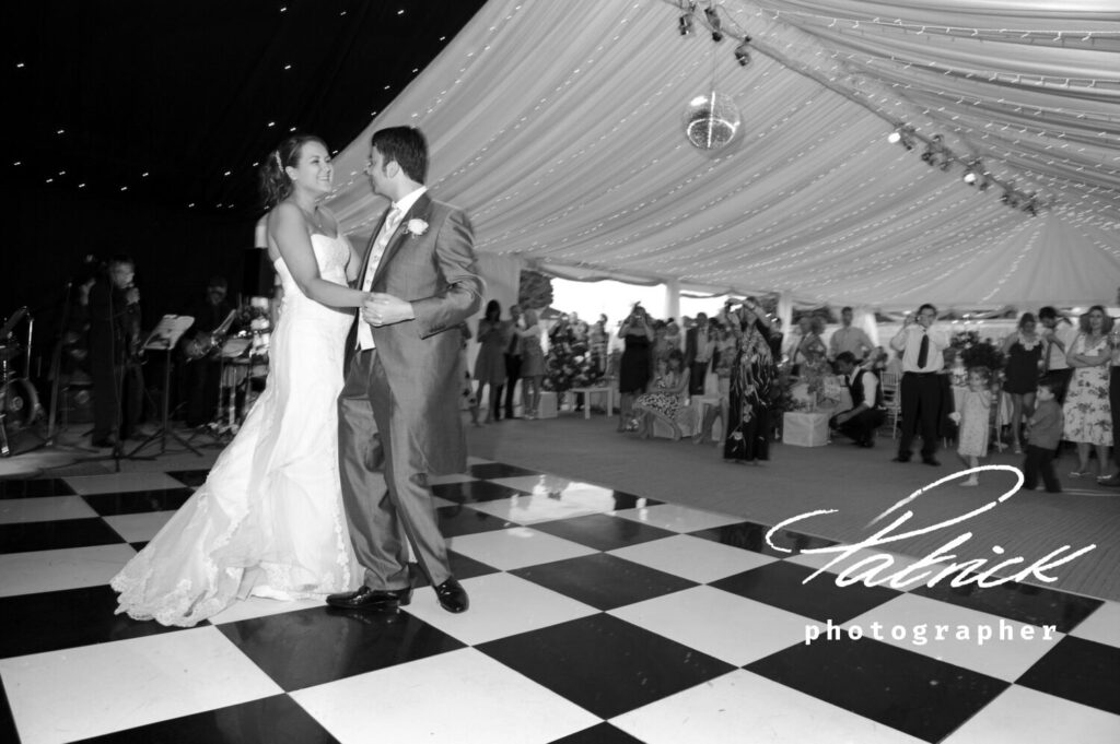 hexton manor, chequered floor, first dance, marquee, black and white image